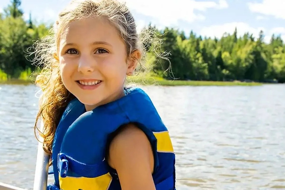 A girl wearing a life jacket