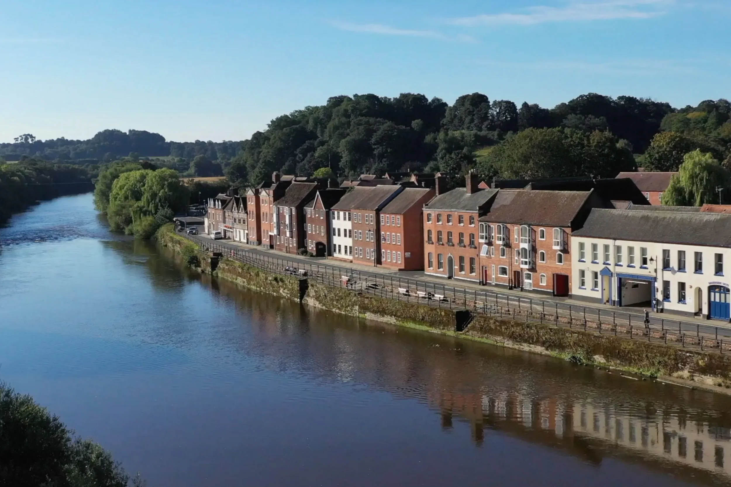 A row of Georgian building alongside a river 